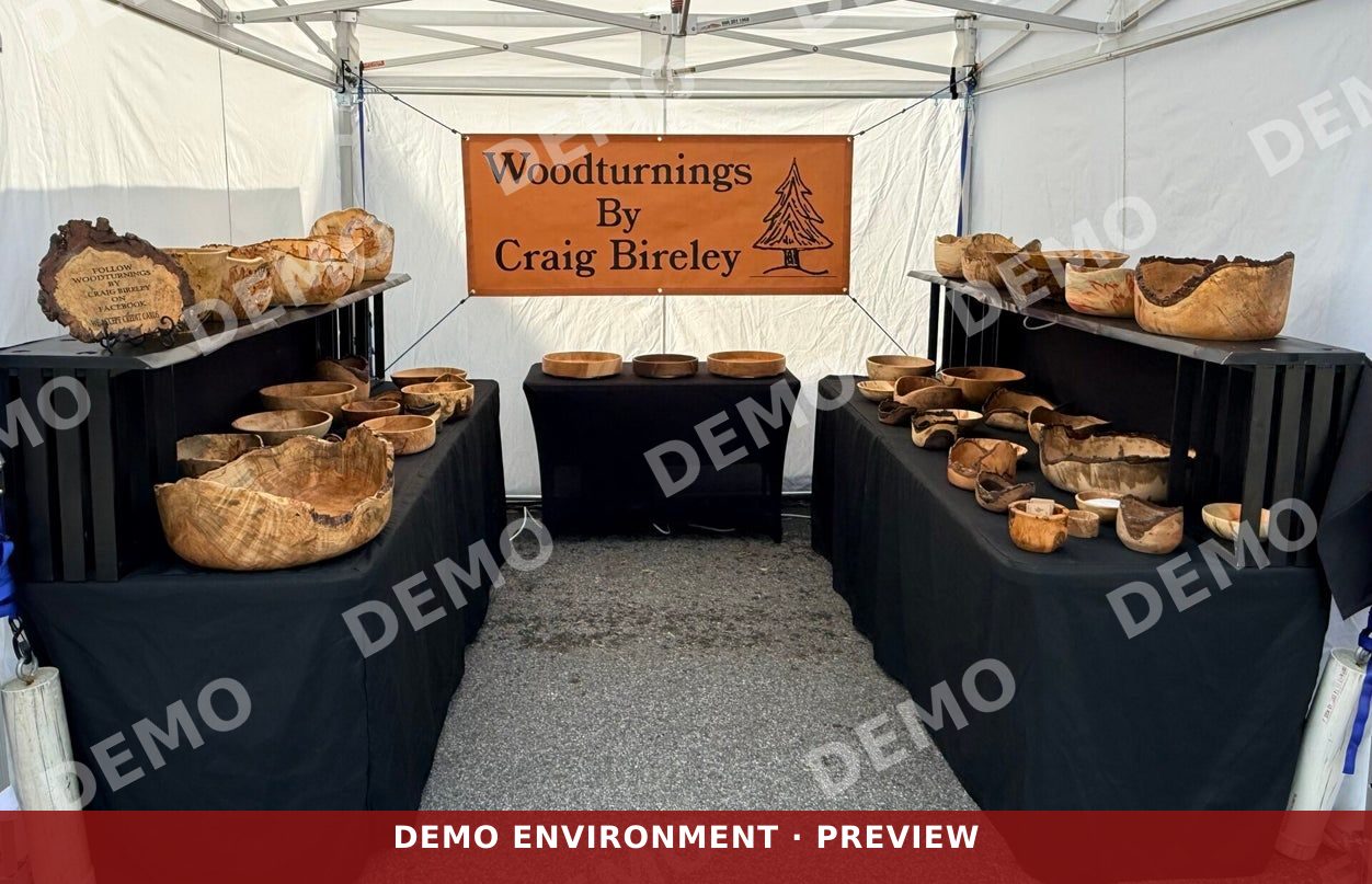 Craig's woodturnings displayed together on a show table